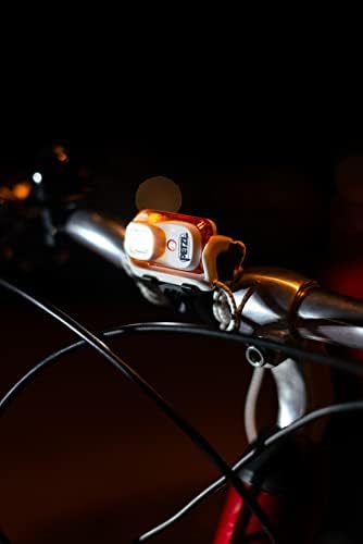 Petzl Bindi Headlamp - compact reYOuRestartable headlamp with 200 lumen - orange