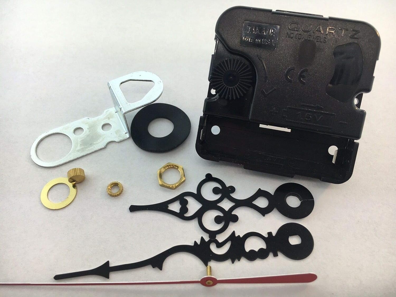 Generic quartz clock movement with gold serpentine hands USA made