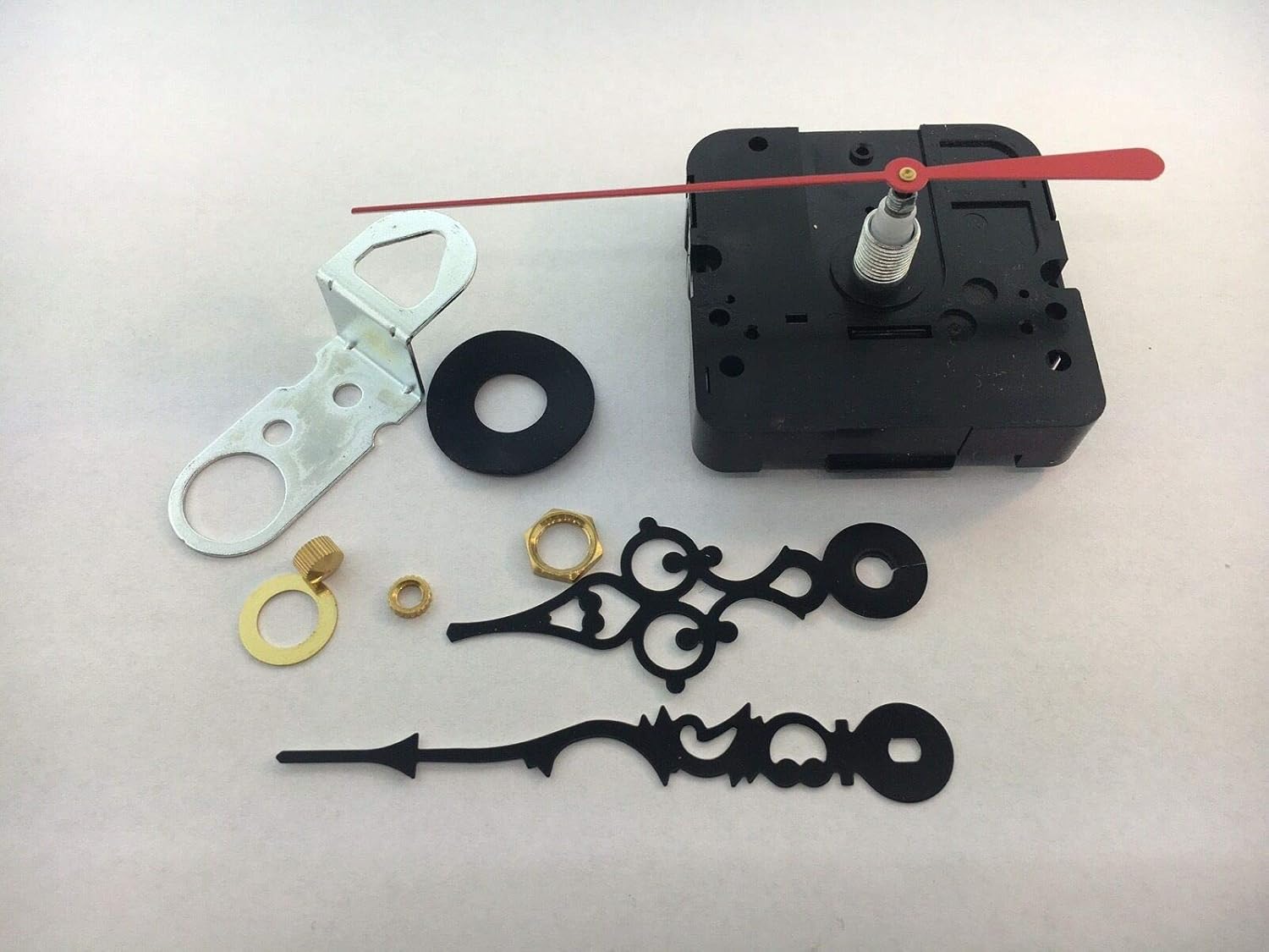 Generic quartz clock movement with gold serpentine hands USA made